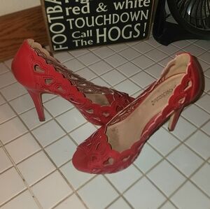 Elegant Red High Heeled Pumps with Cutout Details